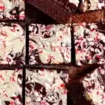 Delicious peppermint dark chocolate brownies topped with festive decorations