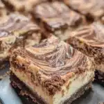 Nutella Swirl Cheesecake Bars 7 nutella swirl cheesecake bars 2026 02 09 154840 819x1024 1