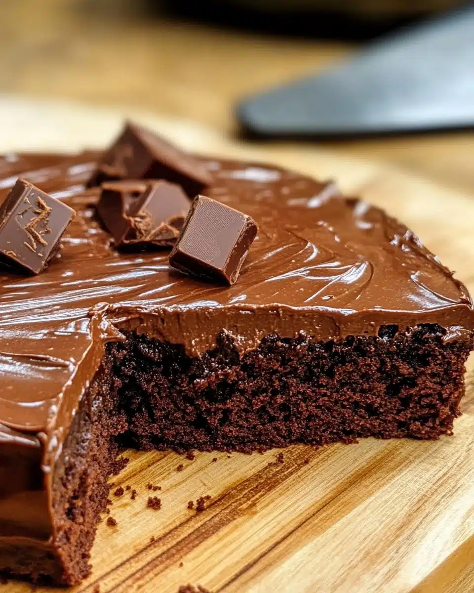 Deliciously rich and moist chocolate fudge cake with a glossy chocolate glaze
